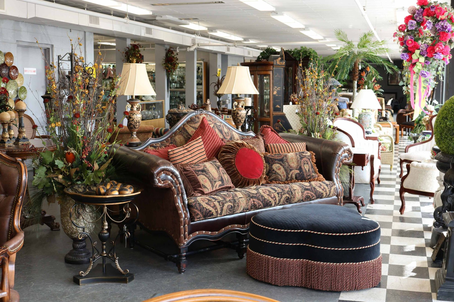 Professionally arranged estate furnishings in the Bluegrass Auction gallery